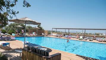 Seasonal outdoor pool, pool umbrellas, sun loungers
