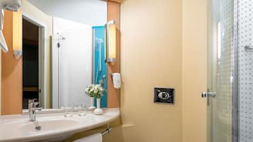 Shower, eco-friendly toiletries, hair dryer, slippers