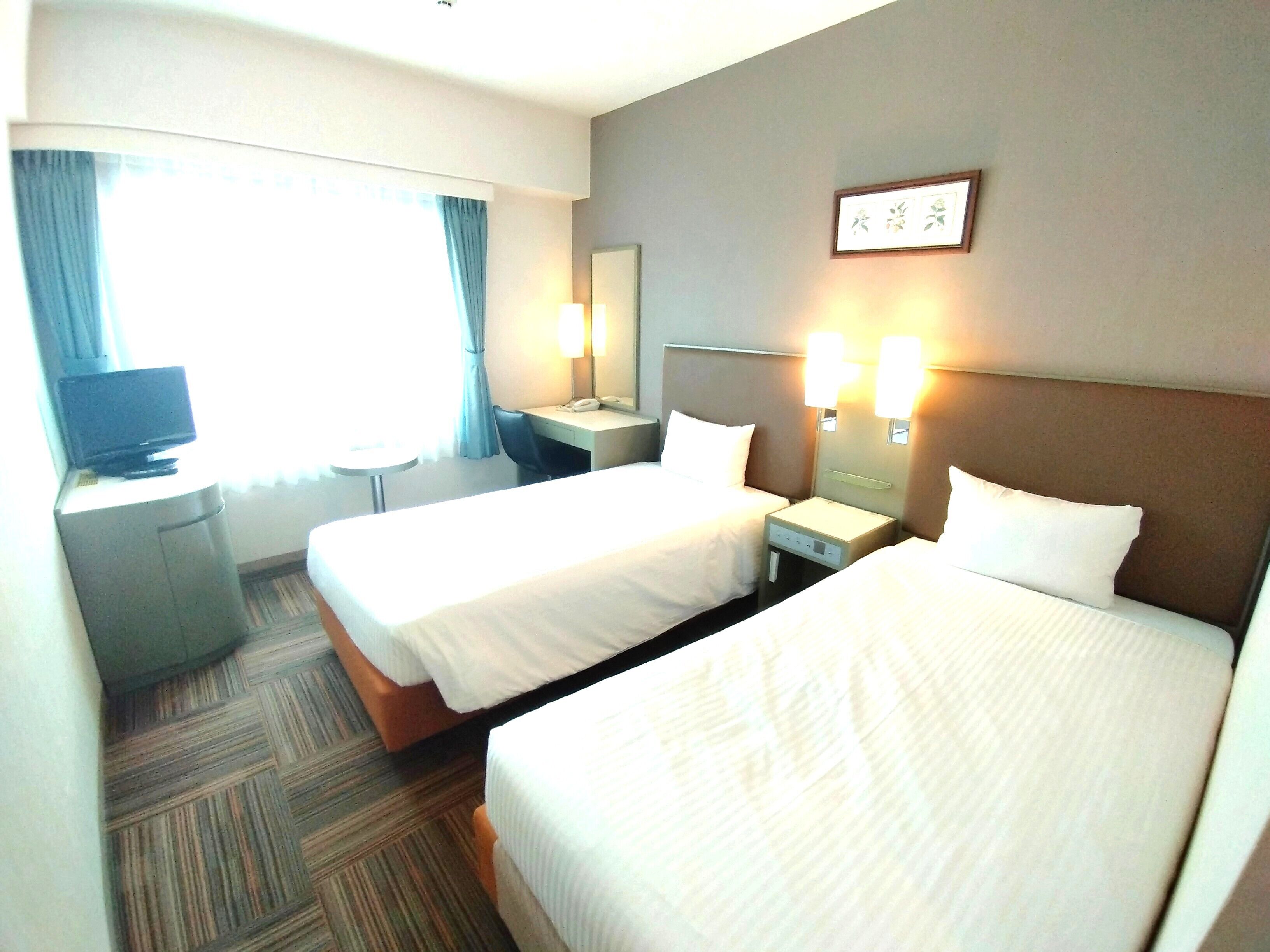Desk, blackout curtains, iron/ironing board (on request), free WiFi