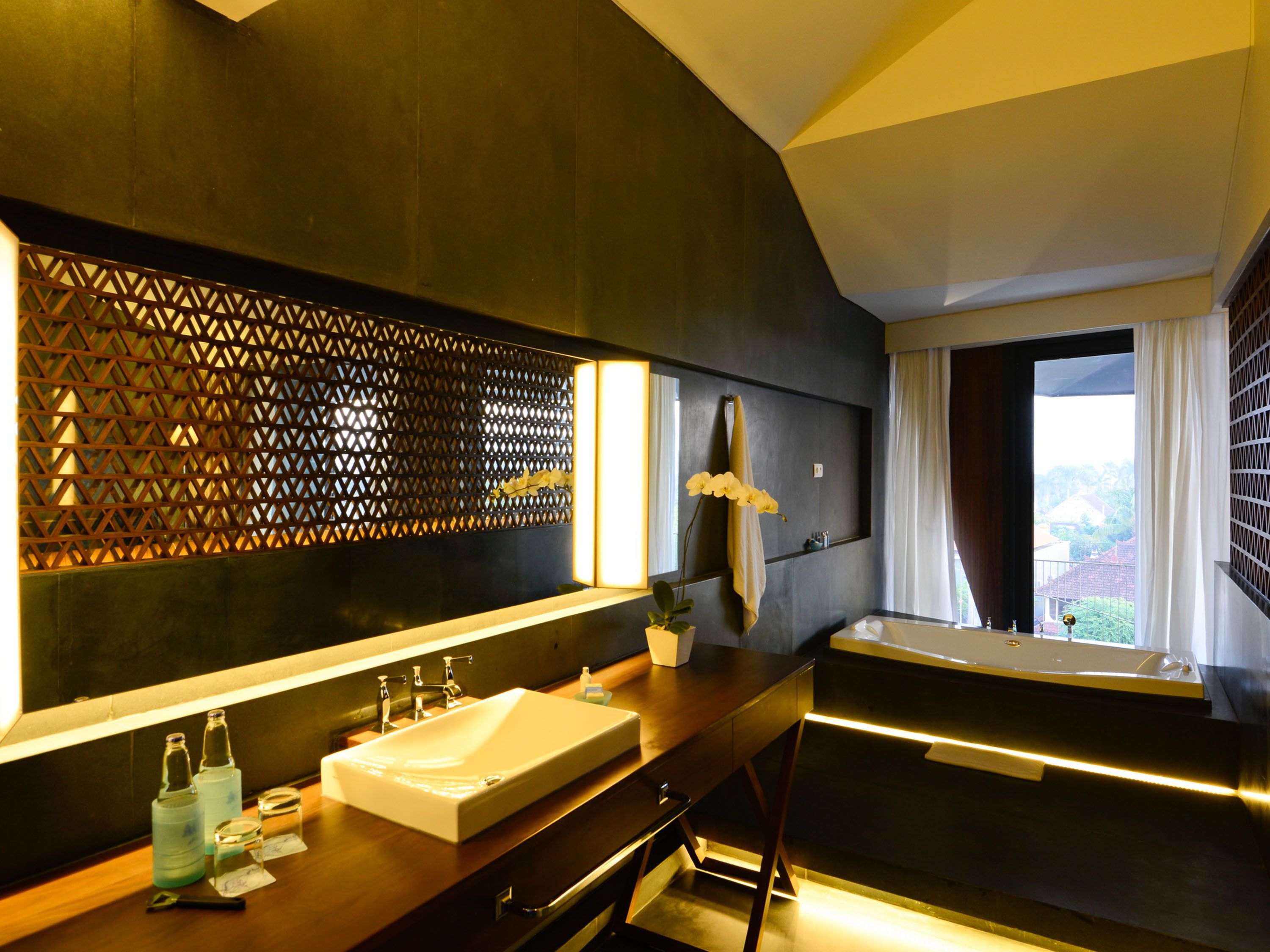 junior suite | bathroom | shower, rainfall showerhead, eco-friendly toiletries, hair dryer