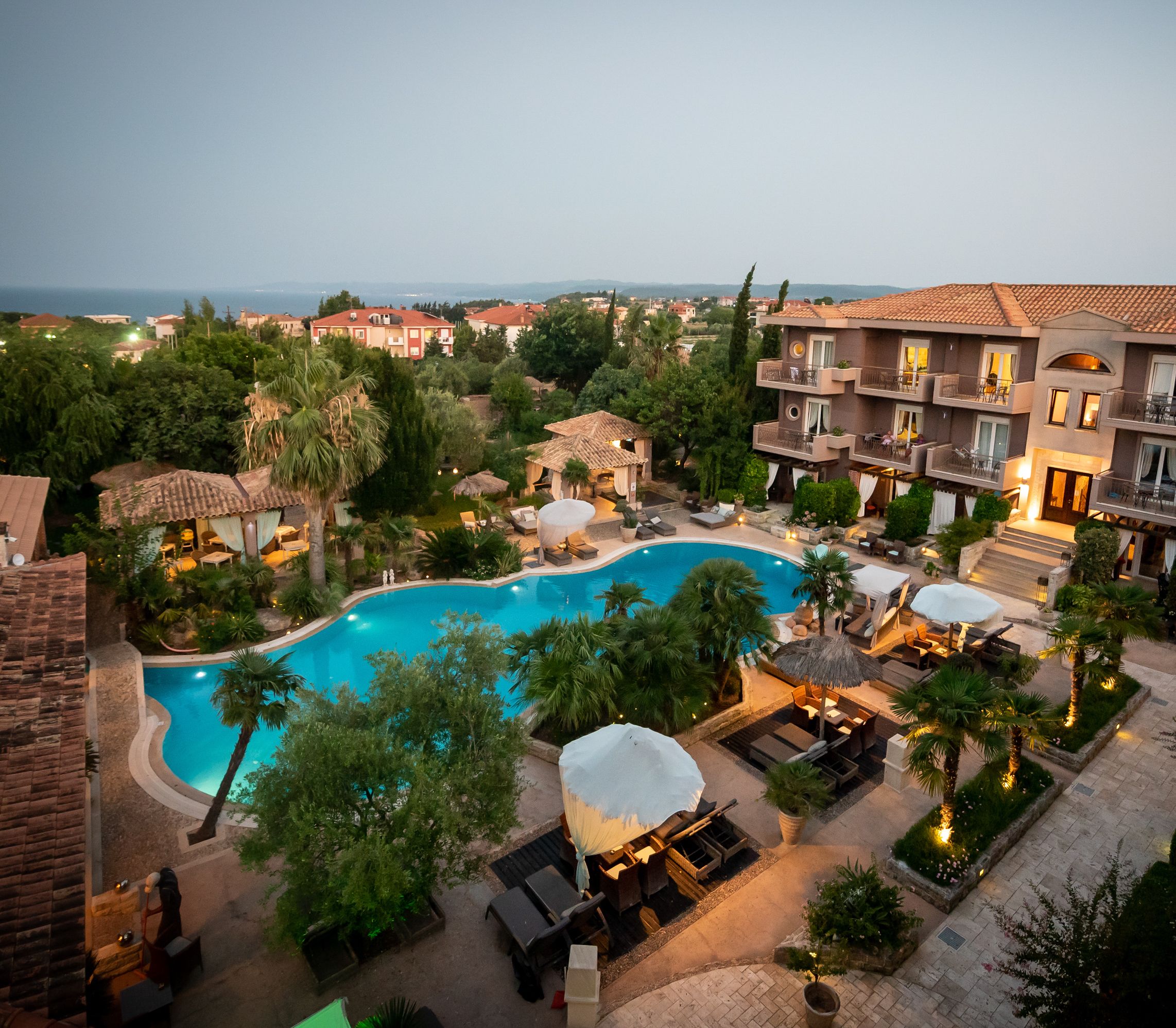 seasonal outdoor pool, pool umbrellas, pool loungers