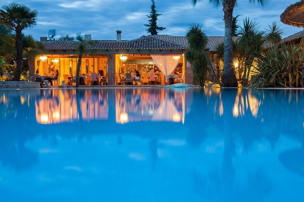 seasonal outdoor pool, pool umbrellas, pool loungers