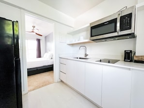 Deluxe Studio, 2 Queen Beds | Private kitchen - Winterset A North Beach Village Resort Hotel (Fort Lauderdale)