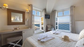 Standard Room, Sea View | In-room safe, soundproofing, iron/ironing board, free cribs/infant beds