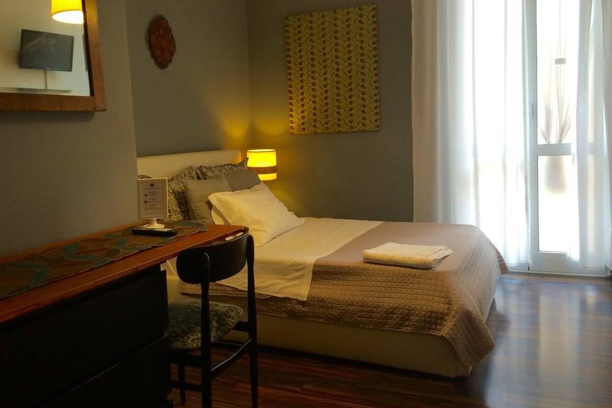 Down duvets, desk, blackout curtains, rollaway beds