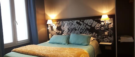 Desk, blackout drapes, soundproofing, free WiFi