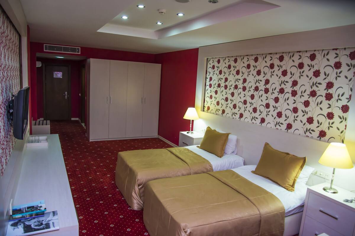 Deluxe Double Room, 2 Bathrooms | Minibar, in-room safe, desk, iron/ironing board (on request)