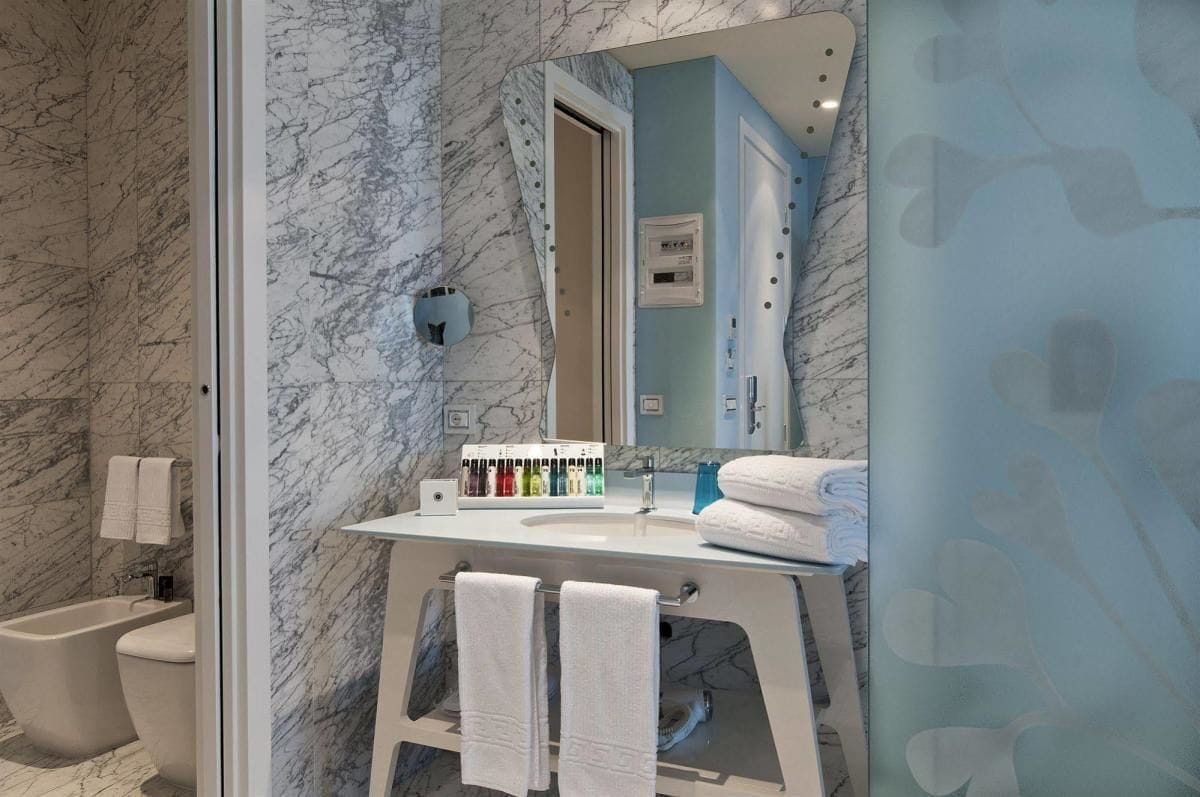 deluxe family room  | minibar, in-room safe, desk, laptop workspace