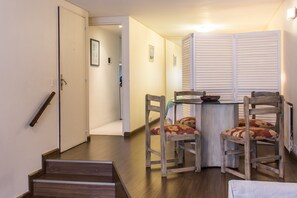 Duplex | Living room | 32-inch LCD TV with cable channels, TV