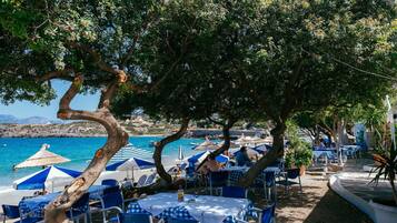 Breakfast, lunch, dinner served; beach views