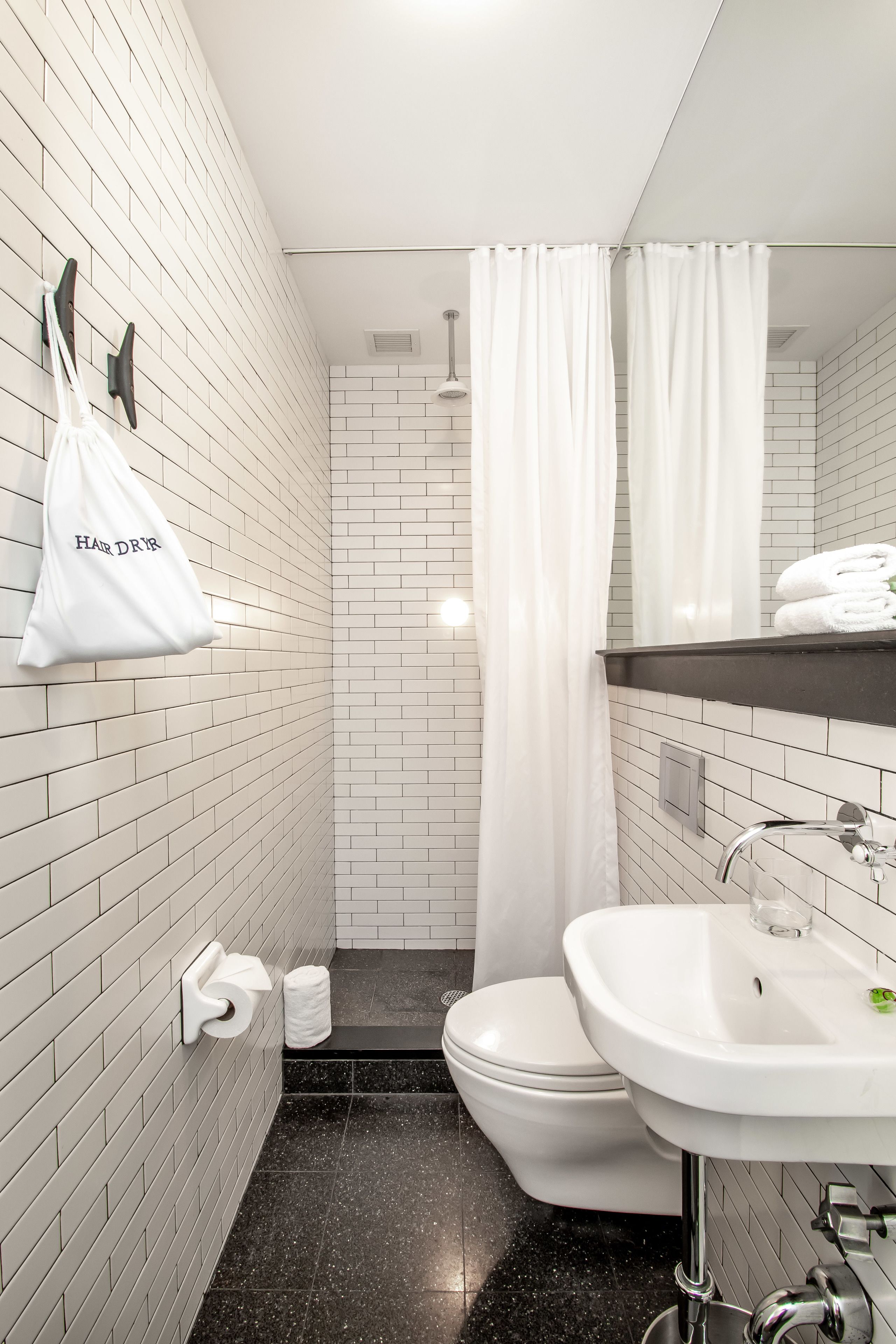 Shower, rainfall showerhead, designer toiletries, hair dryer