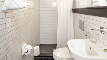 Shower, rainfall showerhead, designer toiletries, hair dryer