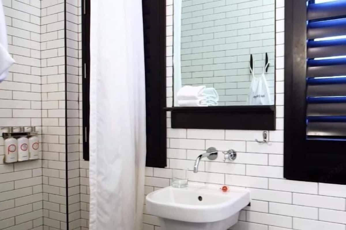 Shower, rainfall showerhead, designer toiletries, hair dryer