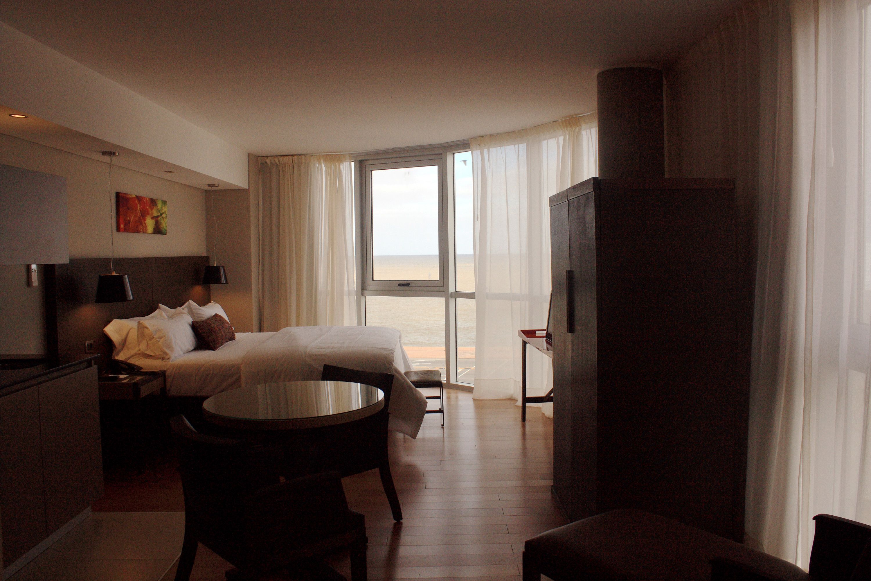 suite, river view | pillow-top beds, minibar, in-room safe, iron/ironing board