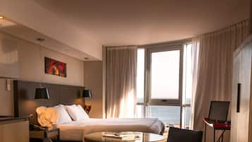 Suite, River View | Pillowtop beds, minibar, in-room safe, iron/ironing board