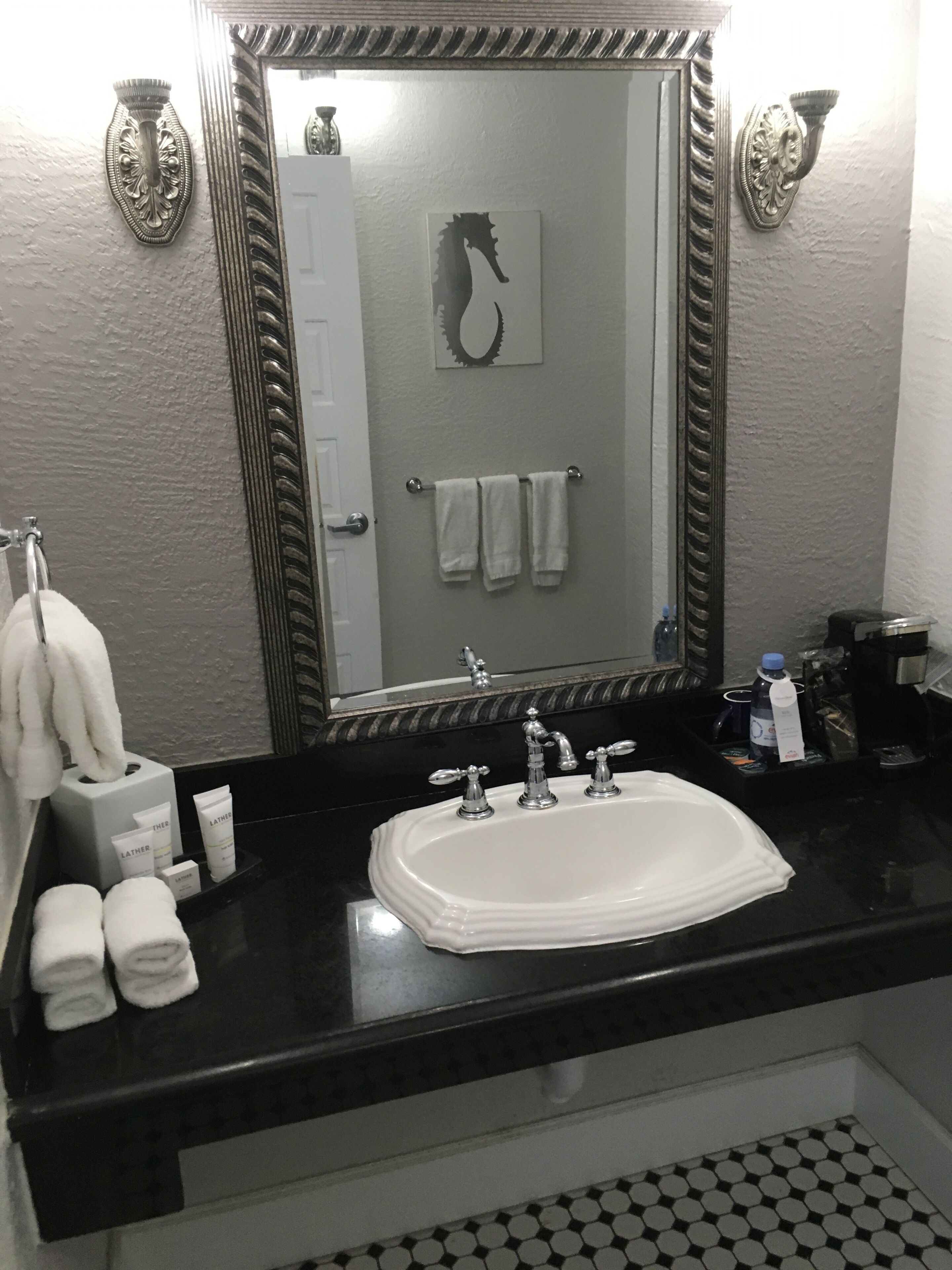 deluxe room, 1 king bed with sofa bed, ocean view (room 504) | bathroom | shower, hair dryer, towels
