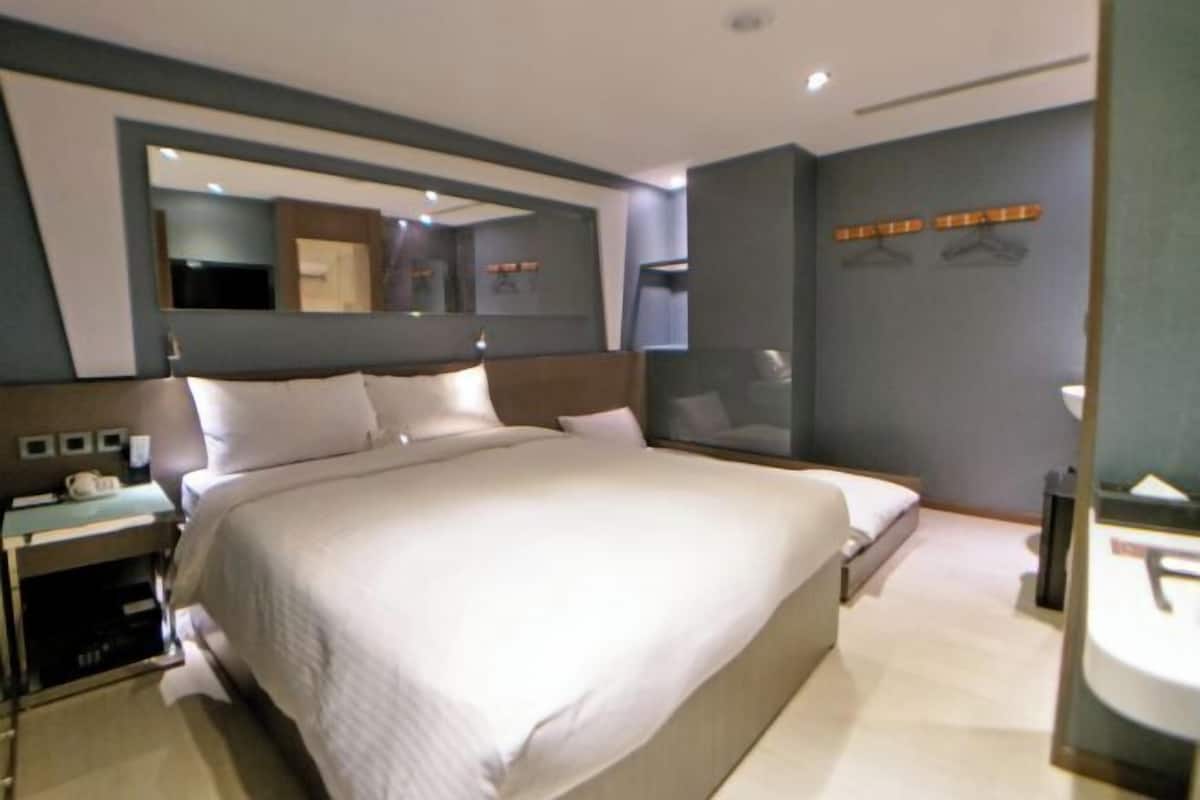 Free minibar, in-room safe, desk, iron/ironing board