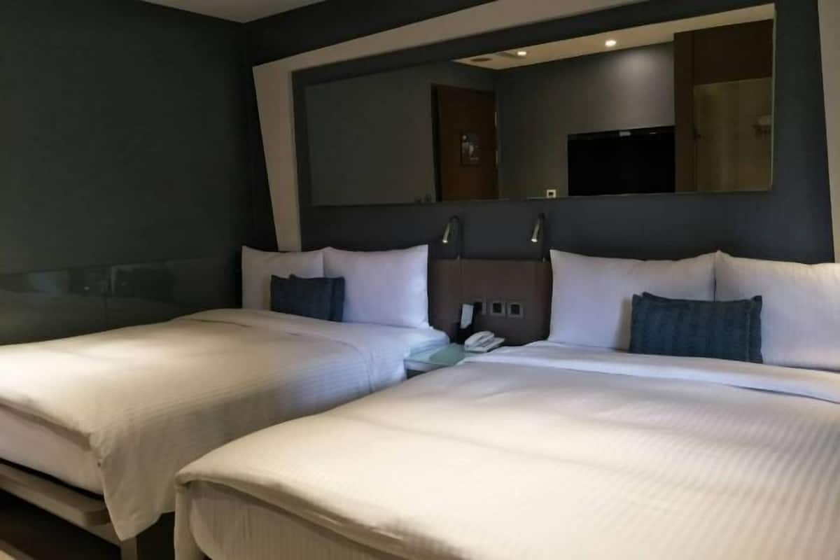 Free minibar, in-room safe, desk, iron/ironing board