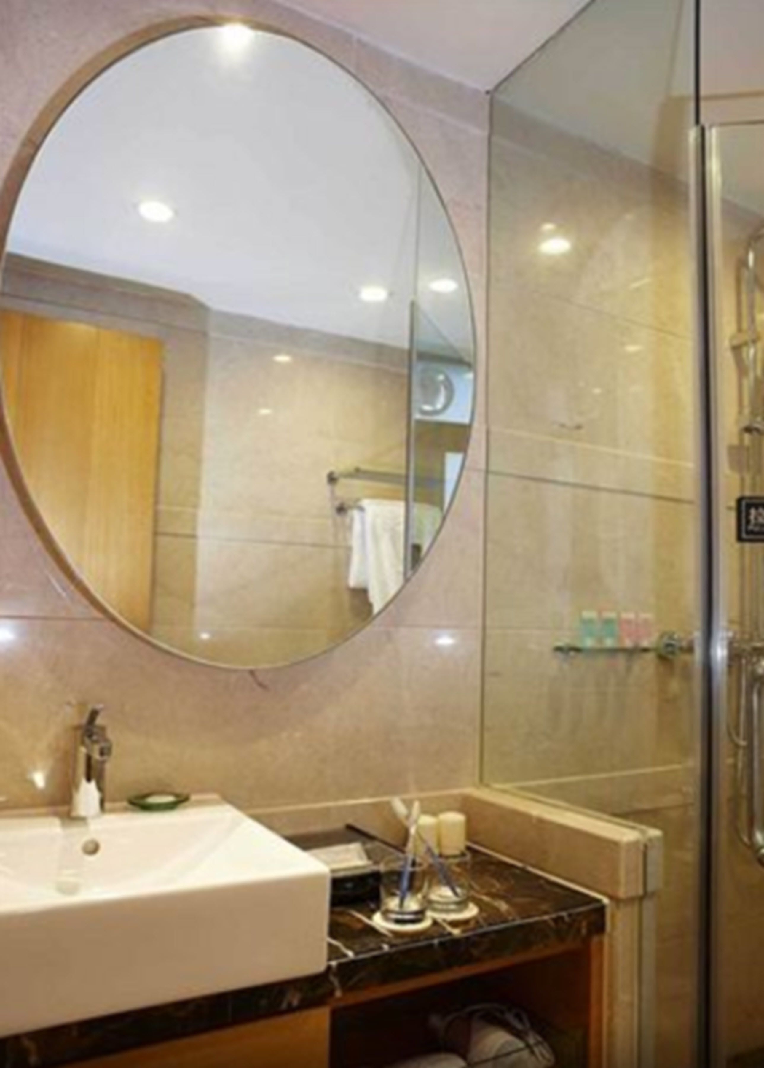 shower, designer toiletries, hair dryer, slippers