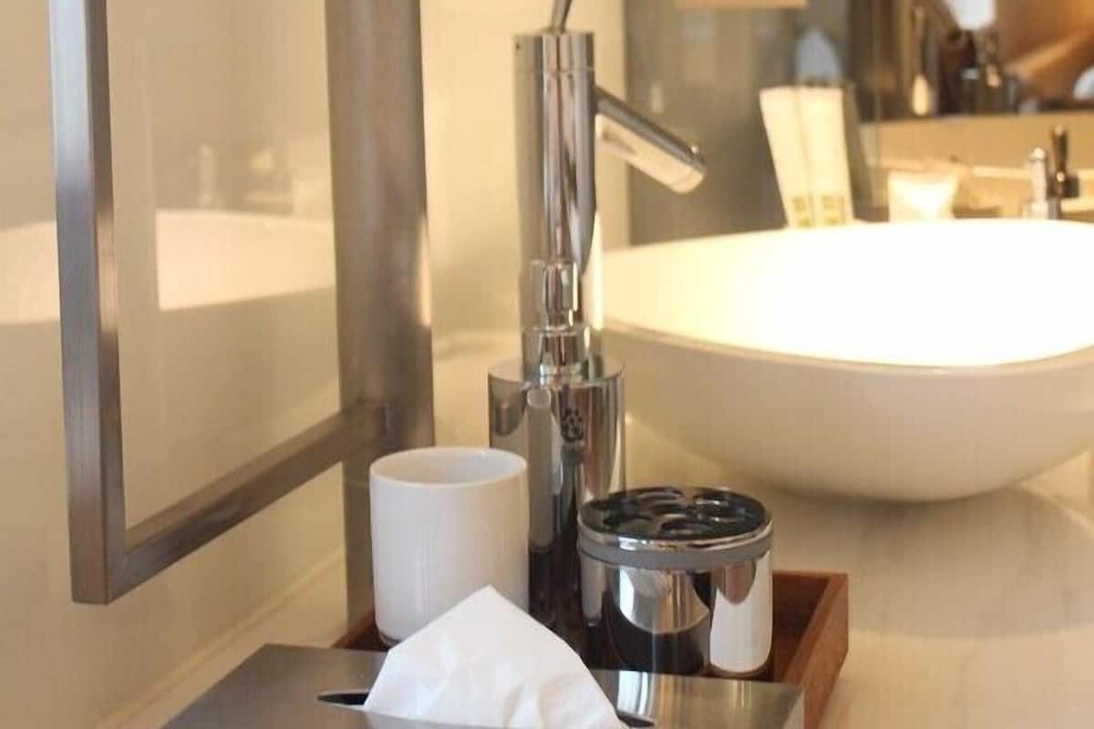 standard double room | bathroom | separate bathtub and shower, towels