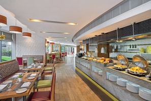 3 restaurants, breakfast, lunch, dinner served; Indian cuisine