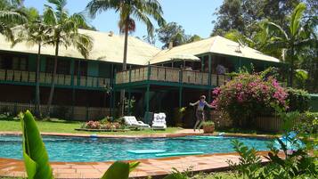 Outdoor pool, pool umbrellas, sun loungers