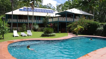 Outdoor pool, pool umbrellas, sun loungers