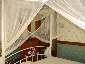 Le Provencale Room (Shared Bathroom) | Egyptian cotton sheets, down comforters, individually decorated