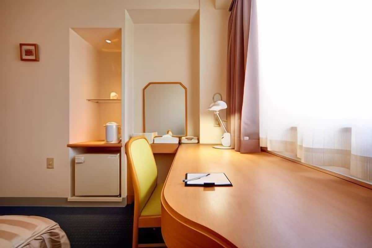 Desk, free WiFi, bed sheets
