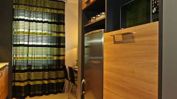 Standard Apartment, Balcony | Private kitchen | Dishwasher, coffee/tea maker