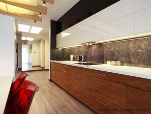 Deluxe Suite, 2 Bedrooms | Private kitchenette | Dishwasher, coffee/tea maker