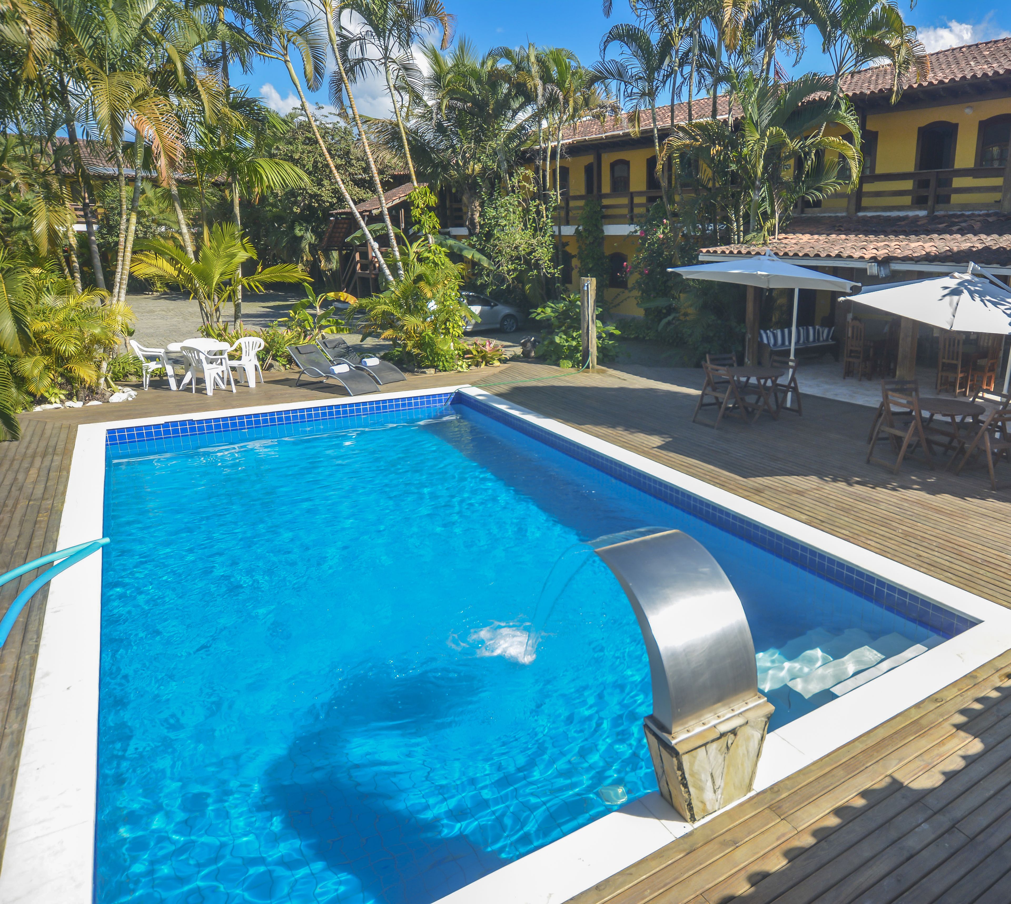 outdoor pool, pool umbrellas, pool loungers