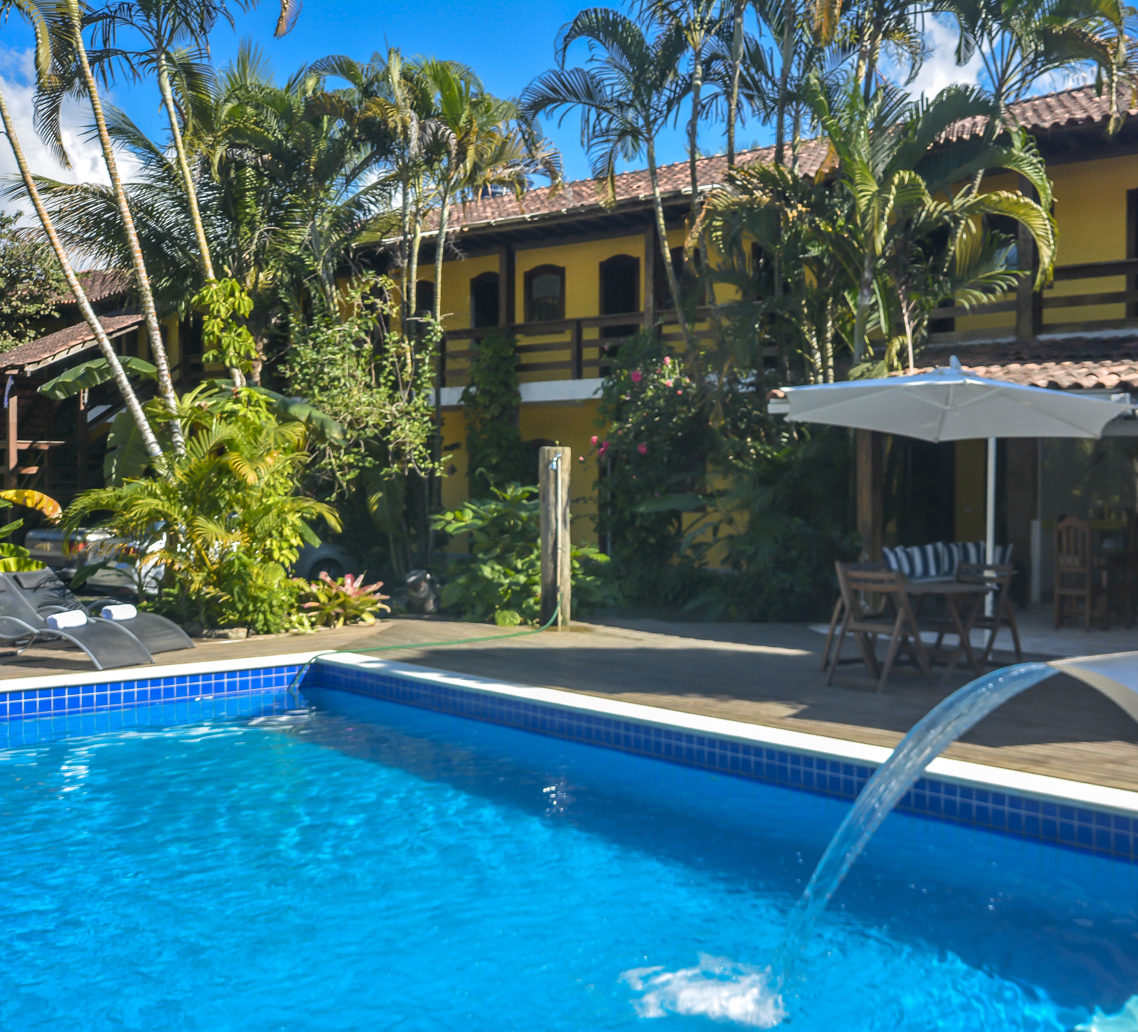 outdoor pool, pool umbrellas, pool loungers