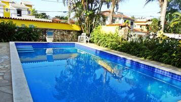 Outdoor pool, pool umbrellas, pool loungers