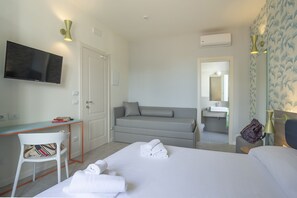Suite studio Junior, Plusieurs lits | Coffre-fort, ameublement unique, rideaux d’obscurcissement