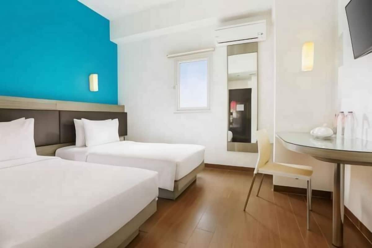 20 slaapkamers, luxe beddengoed, een kluis op de kamer, een bureau