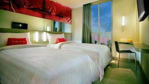 A hotel room with two beds, a desk, a chair, a TV, and a large window. - favehotel Kuta Square (Kuta)