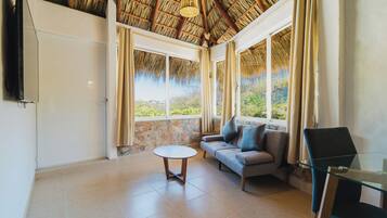 Cabaña | Área de sala de estar | Televisión