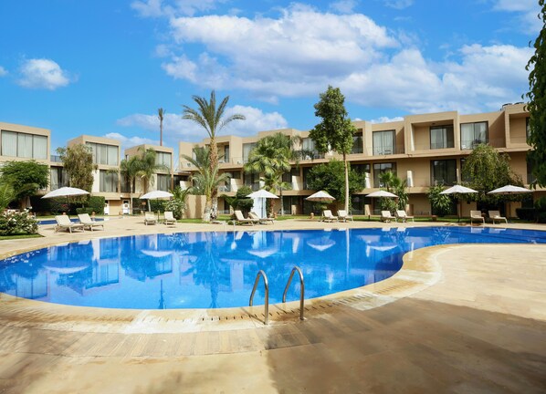 Outdoor pool, pool umbrellas, pool loungers