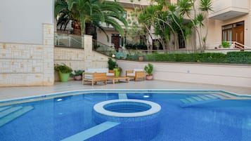 2 outdoor pools, pool umbrellas, sun loungers