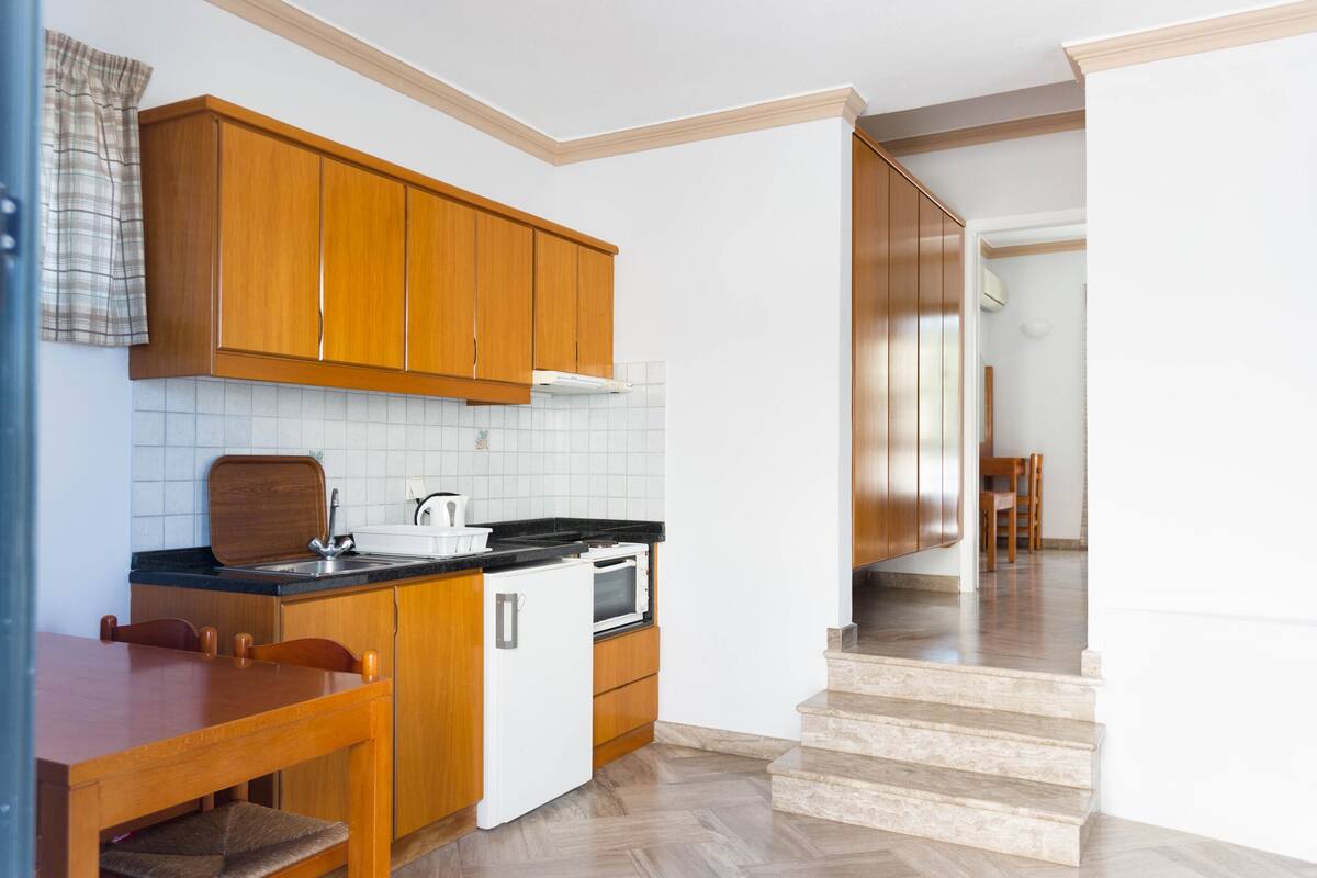 apartment, 1 bedroom, garden view | living area | 40-inch tv with satellite channels, ping pong