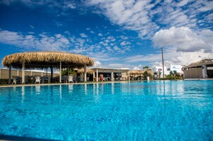 Outdoor pool, pool umbrellas, sun loungers