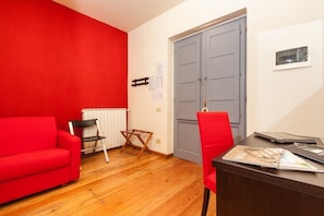 Triple Room | Living area | Flat-screen TV
