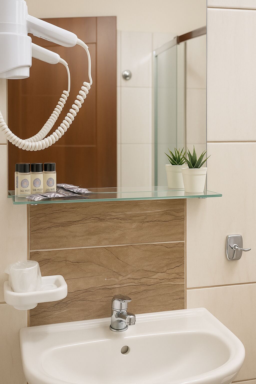 A bathroom with a glass shelf, a hairdryer, a sink, and a mirror.