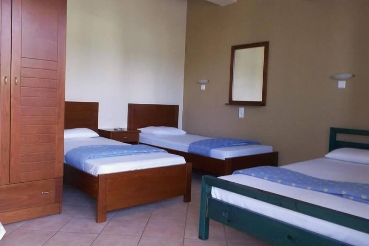 Standard Quadruple Room | Iron/ironing board, cribs/infant beds, free WiFi