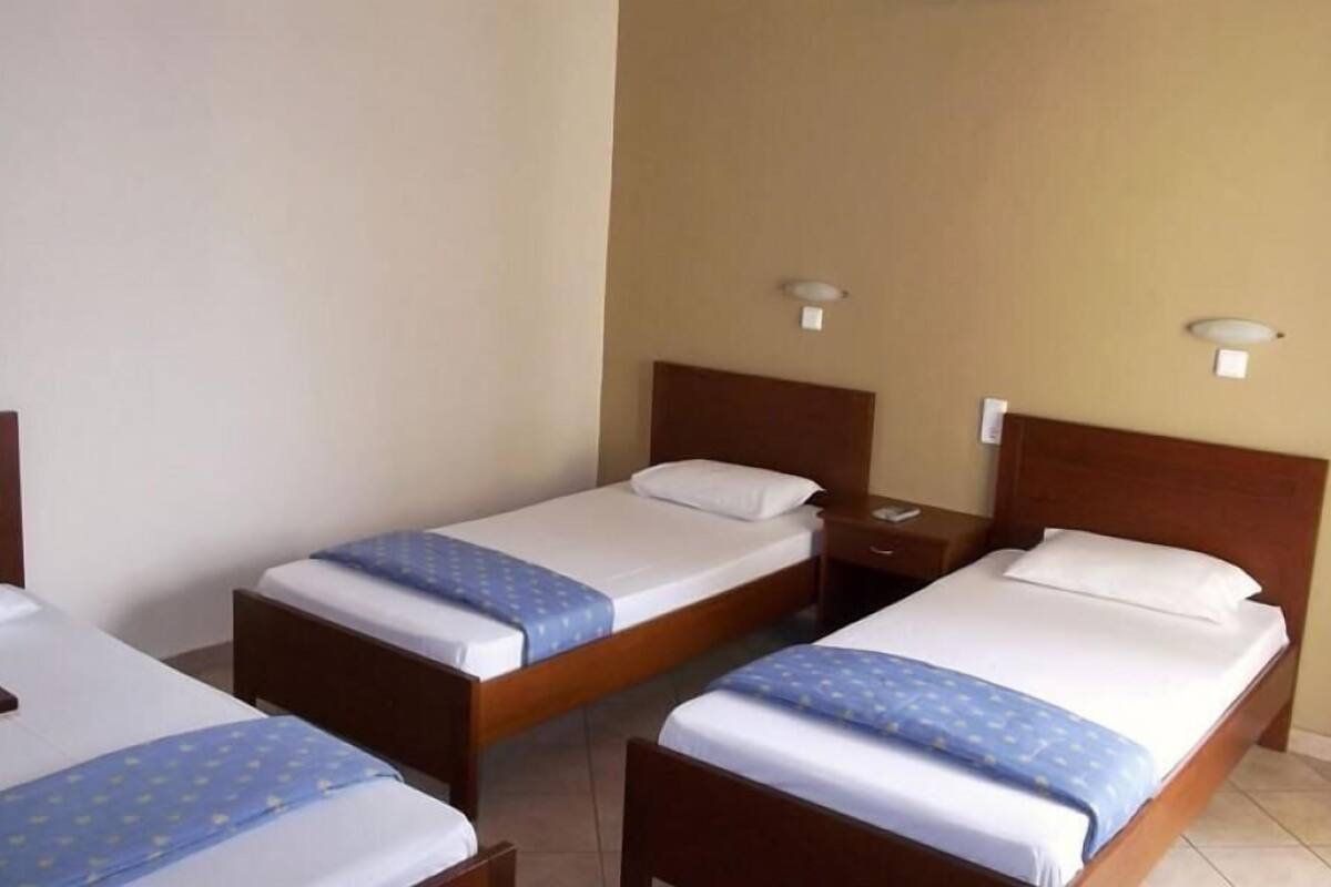 Standard Triple Room | Iron/ironing board, cribs/infant beds, free WiFi