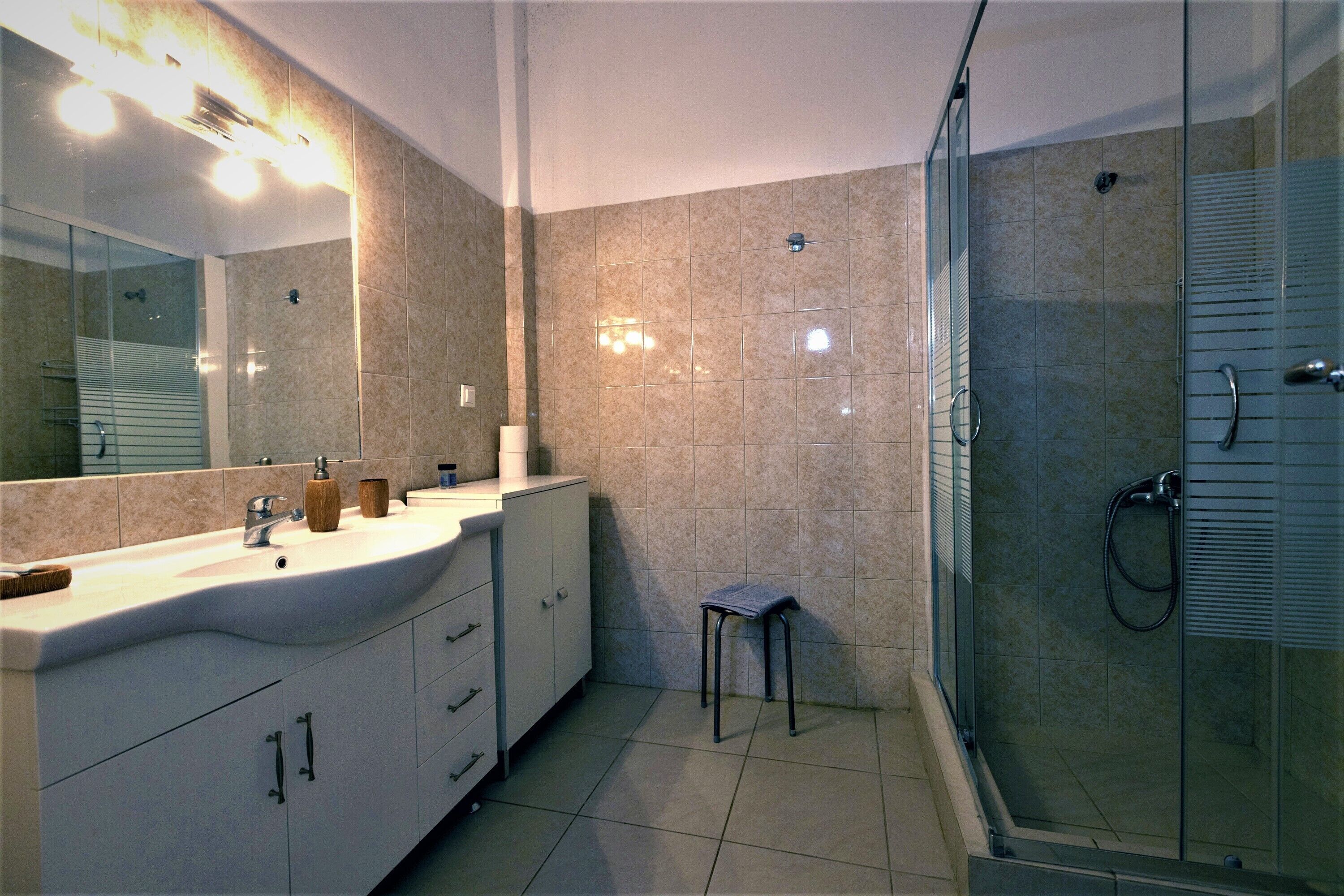 family apartment, 2 bedrooms, mountain view | bathroom | rainfall showerhead, free toiletries, hair dryer, towels