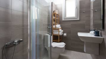 Shower, free toiletries, hair dryer, towels