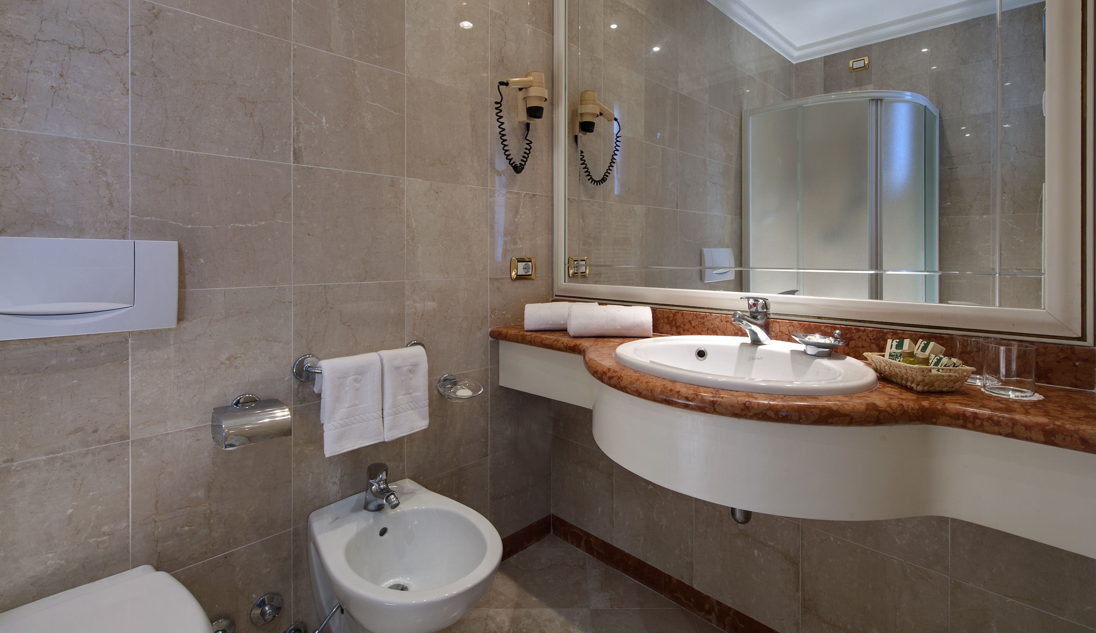 classic double room | bathroom | hair dryer, bidet, towels