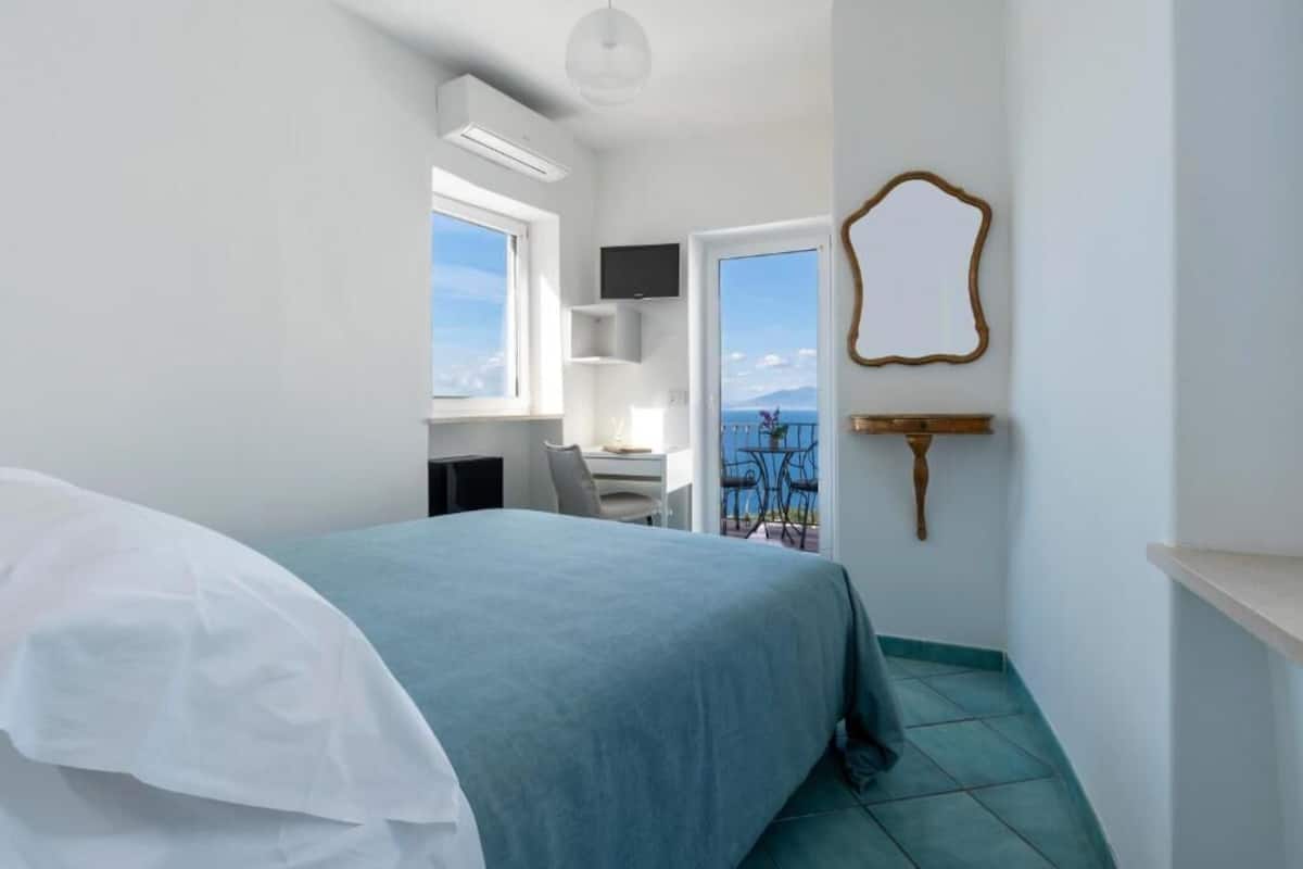 Matrimoniale Deluxe, balcone, vista mare | 1 bedroom, premium bedding, down comforters, in-room safe